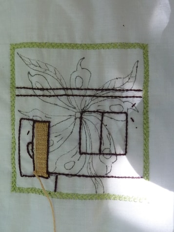 Gezeichnete Blume, dennoch wird ein Haus gestickt !